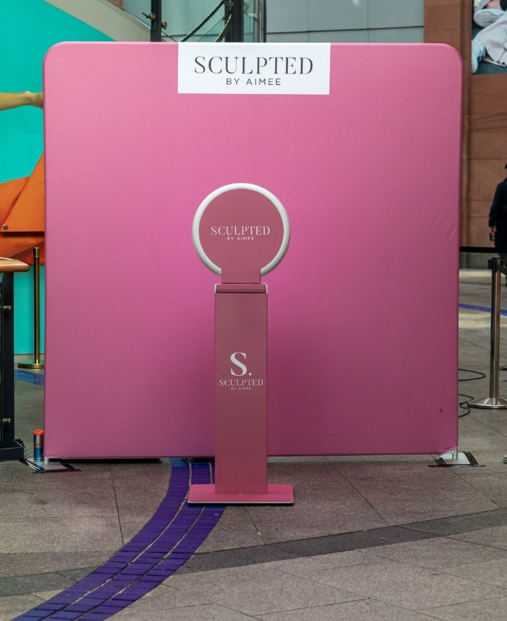 Corporate Booth Activation - Brand Wrap with Pink Backdrop